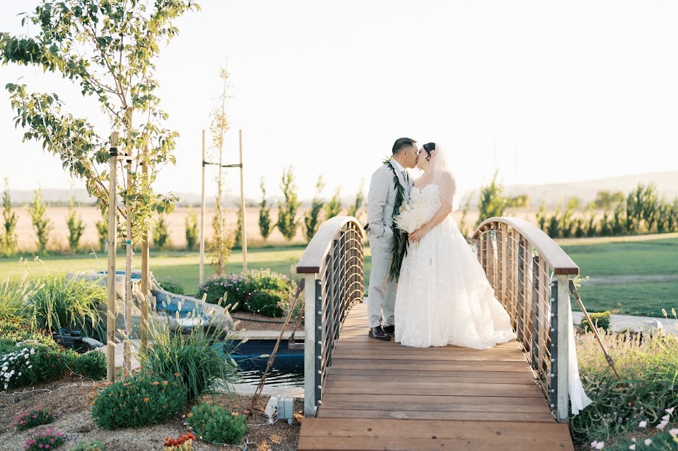 Bride and Groom on Gorgeous Bridge at Chayson Vines